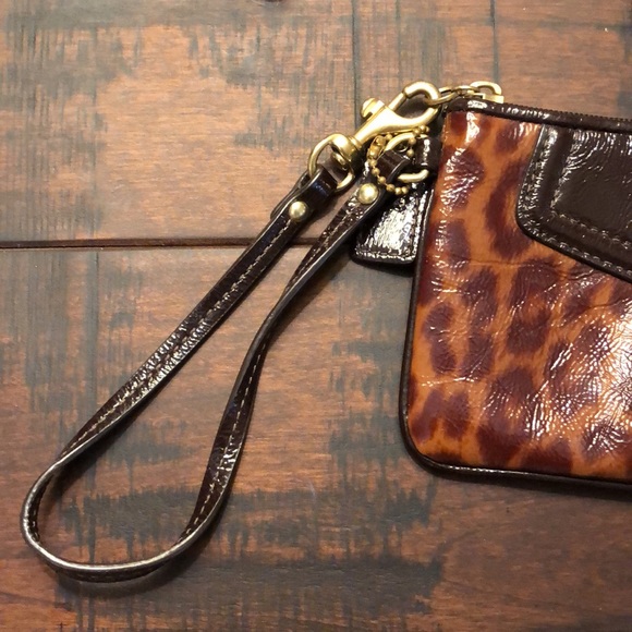 Coach leopard print wristlet. Like new condition. - Picture 2 of 6